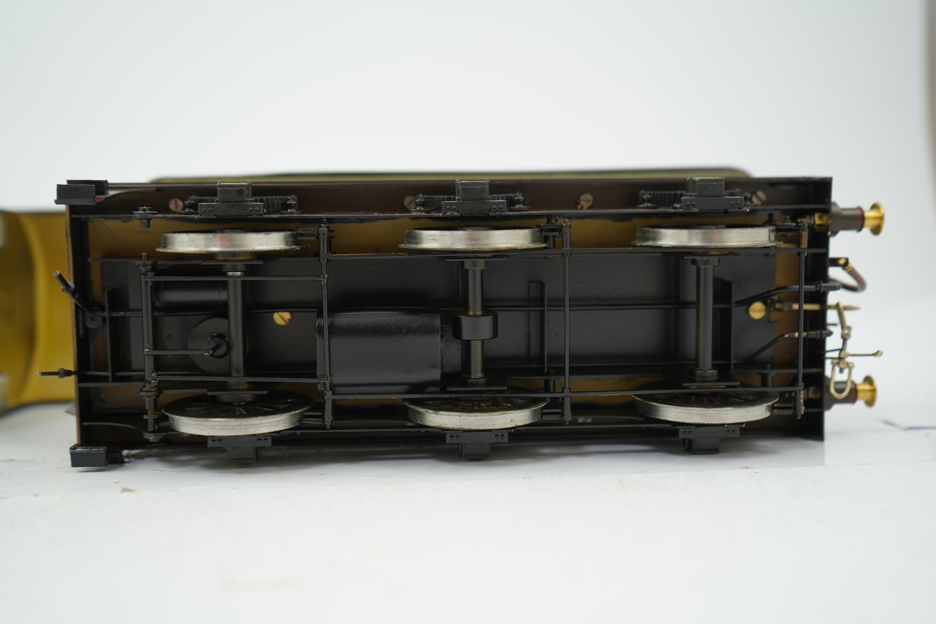 A Gauge One model of North British Railways H Class Auld Reekie 872, 4-4-2 Atlantic tender locomotive, the model has been left unpowered to allow for a high level of detailing of the valve gear and cylinders between the
